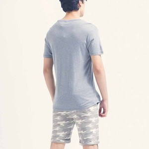 เสื้อยืดคอกลมผ้าฝ้ายคุณภาพสูง เนื้อนุ่มพิเศษ เป็นมิตรต่อสิ่งแวดล้อม ระบายอากาศได้ดี สำหรับผู้ชาย ทรงปกติ ดีไซน์คลาสสิก พิมพ์ลายโลโก้ทั่วตัว - Product Image 1