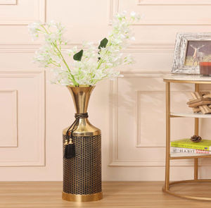 Modern <b>gold</b> <b>vase</b> with an exquisite black honeycomb mesh overlay and a decorative black tassel available at wholesale prices. - Product Image 1