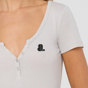 Women's <b>White</b> <b>V</b>-<b>Neck</b> Short Sleeve Crop Top Button Front Logo Minimalist Design Slim Fit Knitted Cotton Spring Summer Wear - Product Image 3