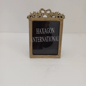 Decorative metal photo <b>frame</b> with antique brass finished and intricate floral designs perfect for elegant interiors - Product Image 6