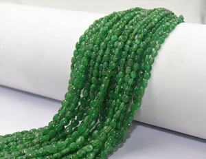 Perles ovales lisses en Tsavorite naturelle de haute qualité de 16 pouces, excellentes pour la fabrication de bijoux en pierres précieuses en vrac - Product Image 1