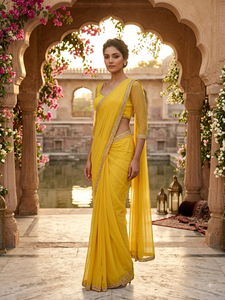 Elegant <b>Yellow</b> Embellished Lightweight Georgette Floor-Length <b>Saree</b> with Designer Border for Festive & Wedding Wear - Product Image 1
