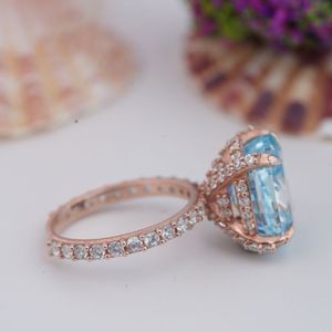 Luxury Women's Rose Gold Plated 925 Sterling Silver Oval Cut 6*8mm 5A Light Blue Moissanite Engagement Ring - Product Image 4