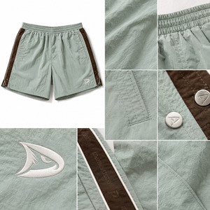 Pantalones Cortos Deportivos Holgados Estilo Y2K Personalizados para Hombre, Color Verde Menta Desgastado, Nailon Arrugado, Estilo Retro Urbano con Ribete Lateral Marrón y Logotipo Bordado - Product Image 5