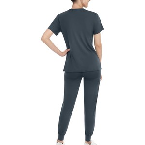 Conjunto de uniforme médico para mujer, top con cuello en V y pantalones con cordón, tela de punto de algodón y poliéster azul. - Product Image 2