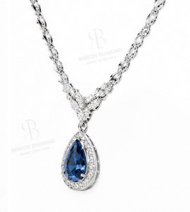 Elegant pendant <b>necklace</b> in 18K white gold with pear cut blue sapphire centerpiece classic halo of sparkling lab grown diamonds - Product Image 4