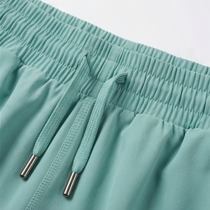 Shorts plissés pour femmes à taille élastique et cordon de serrage, couleur unie, style décontracté d'été, en Spandex et Polyester, confortables à porter - Product Image 4