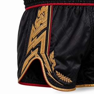 Shorts de Muay Thai personnalisés KhumBro noir, orange et or, en satin brodé de qualité supérieure, pour la boxe, le kickboxing et les combats, unisexe, 100 % polyester - Product Image 6