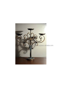 Traditional <b>black</b> iron <b>candelabra</b> with unique form perfect for medieval settings old world decor or vintage homes - Product Image 1
