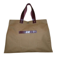 Sac fourre-tout en toile teinte de 12 oz avec poignée en cuir et bordure en cuir sur la poche, avec fermeture à bouton