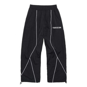 Pantalon de survêtement unisexe personnalisé en nylon, style athlétique avec passepoil, coupe large et ajustable, streetwear pour homme - Product Image 1