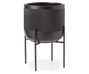 Elegant metal planter with <b>stand</b> designed for showcasing exotic <b>plants</b> and enhancing high-end interior spaces interiors - Product Image 1