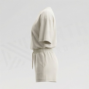 Ensemble décontracté en tricot 2 pièces pour femmes, t-shirt à manches courtes avec imprimé géométrique et short au-dessus du genou, coupe ample, vêtements de printemps et d'été - Product Image 3