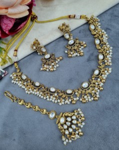 Exquisite Oval Zircon Leaf Motif <b>Necklace</b> Set With Earrings And Mangtika <b>Delicate</b> Light weight Jewellery Sets For Reception Wear - Product Image 1