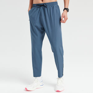 Pantalon de sport en toile pour homme fabriqué en usine, style streetwear élégant, poche imprimée, respirant, 100 % coton, pour la course et l'entraînement - Product Image 1