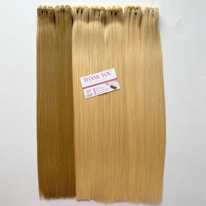 Venta al por mayor de extensiones de cabello de trama de máquina doble de mano suave de longitud personalizada mechones de cabello humano rubio claro materia prima vietnamita - Product Image 6