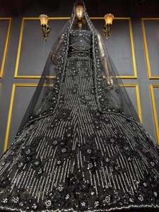 Lehenga choli de mariée entièrement brodé avec des détails en jarkan lourds et une grande traîne, conçu pour un style de mariée traditionnel - Product Image 3