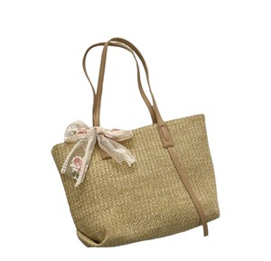 Capture the spirit of modern city life with this stylish Natural yarn bag featuring a structured <b>body</b> and an embroidered <b>bow</b> - Product Image 5