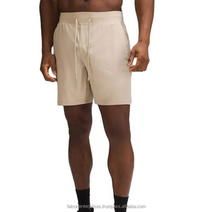 Shorts de sport décontractés légers pour femmes, design personnalisé, respirants, avec poches, fentes latérales, motif uni, service OEM, séchage rapide - Product Image 1