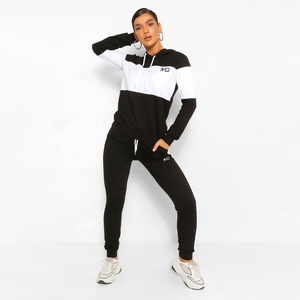 Conjuntos de chándal de invierno al por mayor para mujer: sudadera con capucha y pantalones de chándal - Product Image 1