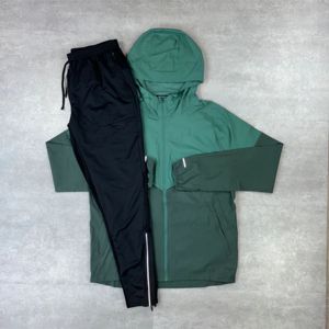 Nouveaux ensembles de shorts coupe-vent légers en nylon pour hommes, avec patchwork brodé et imprimé numériquement, logo OEM personnalisé, couleur contrastante, collection Printemps - Product Image 2