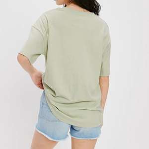 T-shirt en coton vert clair uni pour femme, coupe décontractée, manches courtes, printemps, écologique, respirant, séchage rapide - Product Image 1