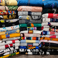 Lots de vêtements en stock : T-shirts pour femmes à épaules tombantes, coupe ample décontractée, style streetwear, liquidation d'entrepôt en gros