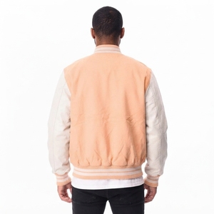 Chaqueta Varsity Unisex de Lana Color Durazno Naranja de TRAMA SPORTS APPAREL, con Bloques de Color y Botones Cubiertos en las Mangas, Personalizable, para Invierno - Product Image 4