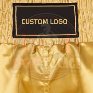 กางเกงชกมวยสีดำทองตัดกัน พร้อมโลโก้สั่งทำ OEM/ODM คุณภาพสูงสุด ผลิตจากโพลีเอสเตอร์ระบายอากาศได้ดี เหมาะสำหรับการฝึกซ้อมในฤดูใบไม้ร่วง - Product Image 3