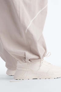 Private Label Unisex Stone Wide Leg Parachute <b>Trousers</b> Contrast Seam <b>Drawstring</b> Nylon Streetwear Pants OEM men's pants - Product Image 6