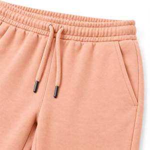 Pantalon de jogging en molleton streetwear personnalisé pour homme avec taille élastique en tissu épais, chevilles affinées et style minimaliste - Product Image 5