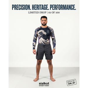 เสื้อแรชการ์ดแขนยาวผู้ชาย 200GSM โพลีเอสเตอร์ผสมอีลาสเทน สำหรับ BJJ MMA ป้องกันแสงแดด รับผลิตแบบ OEM พร้อมสกรีนโลโก้ - Product Image 5