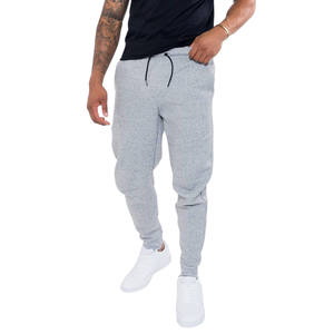 Pantalones blancos para hombre, transpirables, deportivos, de corte ajustado, informales, para gimnasio, fitness, con impresión de logotipo personalizado. - Product Image 1