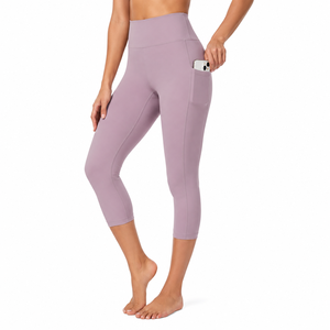 High Waisted Calf-Length Yoga <b>Leggings</b> <b>With</b> <b>Pockets</b> Four-Way Stretch Seamless Solid Purple Women's <b>Workout</b> Pants - Product Image 4