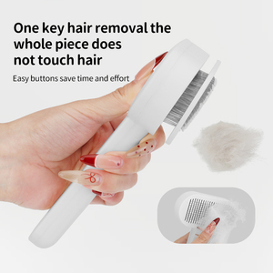 Produits de soins pour animaux : Brosse démêlante portable auto-nettoyante pour poils de chien et de chat, vente en gros - Product Image 1