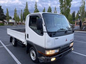 Venta al por mayor: Camioneta diésel 4x4 Canter Guts modelo 1998 de segunda mano con aire acondicionado, transmisión de 5 velocidades, volante a la derecha, ¡lista para enviar con entrega 24/7! - Product Image 4