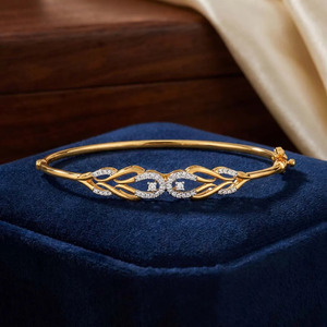 Flowing Leaf Diamond Bangle with Yellow Gold Slim <b>Frame</b> and Elegant Interwoven Center Design - Product Image 4