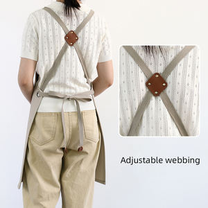 ผ้ากันเปื้อนเอวผ้าฝ้ายกันน้ำพร้อมสายสะพายไหล่แบบไขว้ ปรับได้ มีกระเป๋าใบใหญ่ ใช้สำหรับทำความสะอาด  สามารถสกรีนโลโก้แบบนูนได้ - Product Image 5