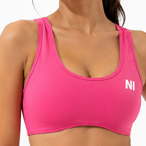 Women's Pink Racerback Sports Bra Scoop Neck Medium Support Breathable Seamless Fitness Top Solid Color Front Logo - Product Image 6
