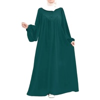 Nouveau musulman printemps et automne mode décontracté bulle à manches longues Simple couleur unie col rond bouton femmes combinaison longue robe