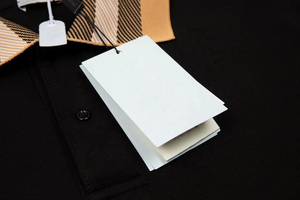 Camisa de punto de algodón sólido con logotipo bordado personalizado OEM para hombre y mujer, estilo retro informal de negocios a la moda. - Product Image 4