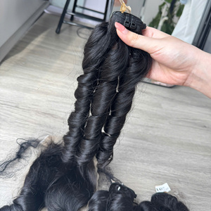 Precio al por mayor 100% Raw Virgin vietnamita humano encaje peluca trama hinchable rizado Color Natural Super doble dibujado extensiones de cabello - Product Image 1
