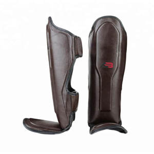 Protège-tibias de haute qualité avec un design durable, un matériau respirant et un tissu doux pour l'entraînement - Product Image 1