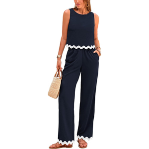 Ensemble 2 pièces d'été pour femme : débardeur court à volants et pantalon large bleu marine uni, respirant et tissé - Product Image 1