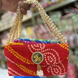 <b>Red</b> Bandhani Print Ethnic Potli Bag for Women Cultural Events Stylish Premium Silk Fabric Lightweight Handbag - Product Image 1