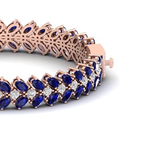 กำไลเทนนิส REYES ผลิตตามสั่ง ทองคำแท้ 14K ประดับเพชรโมอิสซาไนต์ทรงรี รับรองโดย GRA พร้อมพลอยไพลินสีน้ำเงิน 17 กะรัต - Product Image 3