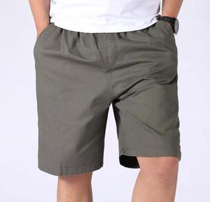 Shorts Bermuda Homme Vert Olive Uni en Coton Vintage Écologique Taille Mi-Haute Fermeture Élastique Style Décontracté avec Poches - Product Image 1