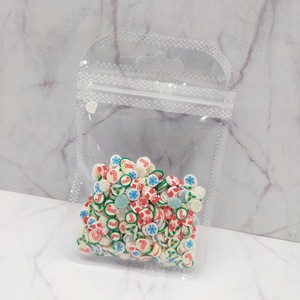Miniaturas de Arcilla Decorativas Navideñas: Rodajas de Santa, Copos de Nieve y Bastones de Caramelo para Proyectos DIY (Edades 14+) - Product Image 5
