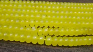ลูกปัดพลอยออนิกซ์สีเหลืองธรรมชาติทรงรอนเดลล์เรียบขนาด 8 มม. ขายเป็นเส้นยาว 8 นิ้ว - Product Image 2