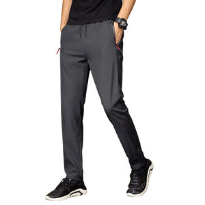 Jeans en denim extensible pour hommes, coupe slim, coutures renforcées et tissu doux en mélange de coton pour une flexibilité tout au long de la journée - Product Image 1